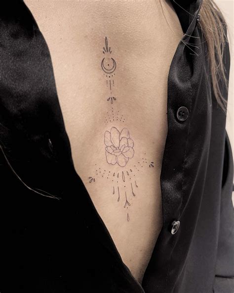 24 Elegant Under Breast Tattoo Ideas for Women